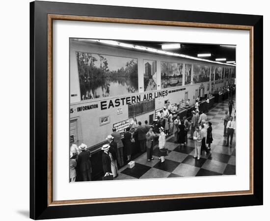 Eastern Airline Customers Checking in their Baggage at the Check-In Counter-Ralph Morse-Framed Photographic Print