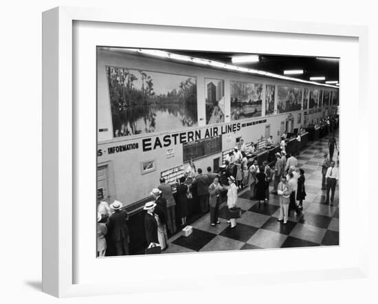 Eastern Airline Customers Checking in their Baggage at the Check-In Counter-Ralph Morse-Framed Photographic Print