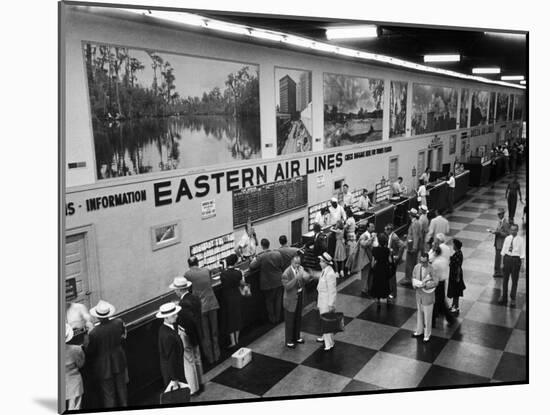 Eastern Airline Customers Checking in their Baggage at the Check-In Counter-Ralph Morse-Mounted Photographic Print