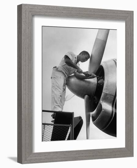 Eastern Airline Employees Working on the Maintaining an Aircraft's Engine-Ralph Morse-Framed Photographic Print