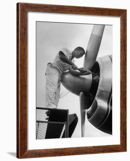 Eastern Airline Employees Working on the Maintaining an Aircraft's Engine-Ralph Morse-Framed Photographic Print