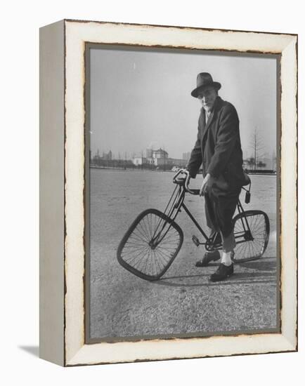 Eccentric Square-Wheeled Bicycle-Wallace Kirkland-Framed Premier Image Canvas