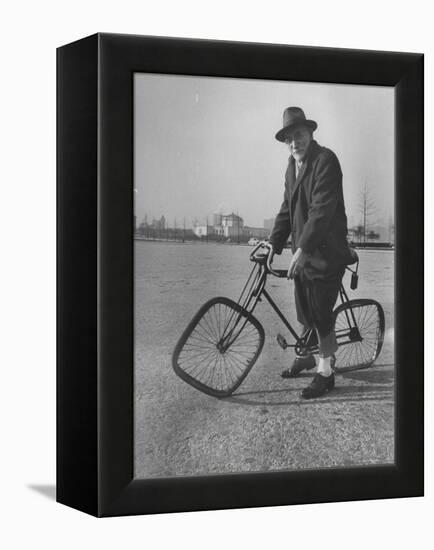 Eccentric Square-Wheeled Bicycle-Wallace Kirkland-Framed Premier Image Canvas