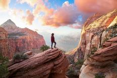 Adventurous Woman at the Edge of a Cliff is Looking at a Beautiful Landscape View in the Canyon-edb3_16-Photographic Print