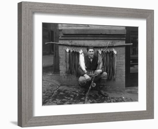 Eddie Bauer with steelhead trout Photograph - Seattle, WA-Lantern Press-Framed Art Print