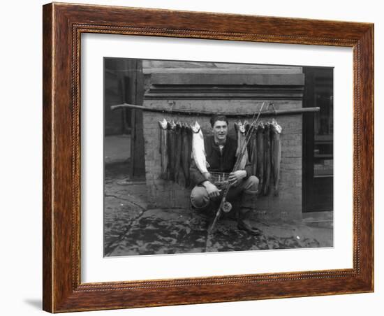 Eddie Bauer with steelhead trout Photograph - Seattle, WA-Lantern Press-Framed Art Print