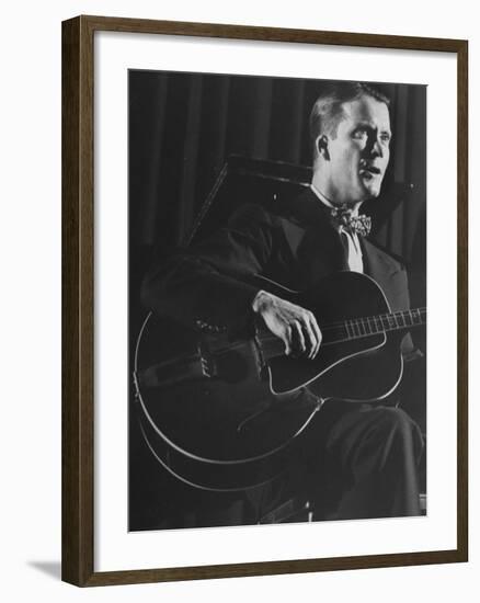 Eddie Condon Playing His Quitar During Jazz Concert at Town Hall-Gjon Mili-Framed Premium Photographic Print