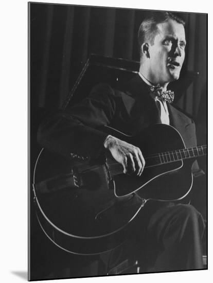 Eddie Condon Playing His Quitar During Jazz Concert at Town Hall-Gjon Mili-Mounted Premium Photographic Print