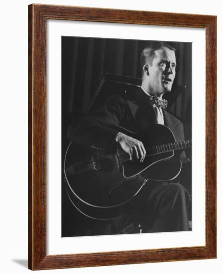 Eddie Condon Playing His Quitar During Jazz Concert at Town Hall-Gjon Mili-Framed Premium Photographic Print