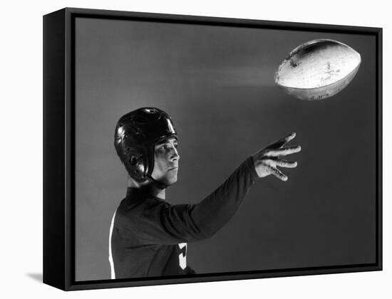 Eddie Miller of NY Giants Demonstrates Spiral Pass by Gripping Ball Along Lacing Close to the Ear-Gjon Mili-Framed Premier Image Canvas