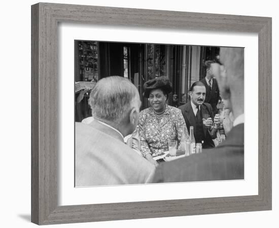 Edith S. Sampson and Cyrille Makinsky at Fouquet's Restaurant-null-Framed Photographic Print