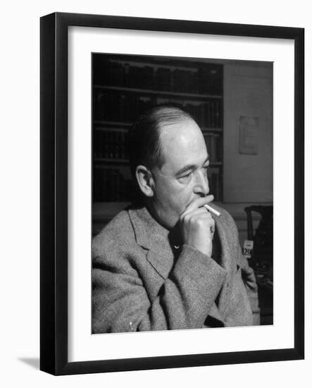 Educator C. S. Lewis Dragging on Cigarette During Interview-null-Framed Photographic Print