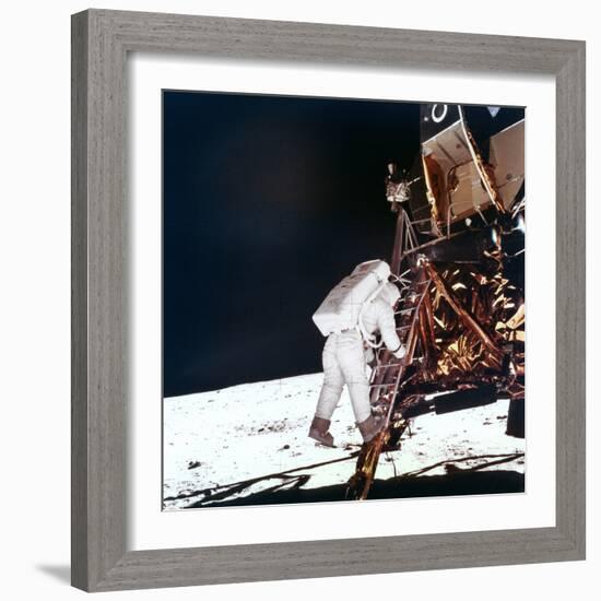 Edwin Buzz Aldrin Descends the Steps of the Lunar Module Ladder to Walk on the Moon, 1969-null-Framed Photographic Print