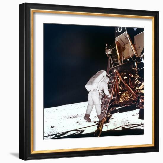 Edwin Buzz Aldrin Descends the Steps of the Lunar Module Ladder to Walk on the Moon, 1969-null-Framed Photographic Print