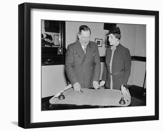 Edwin H. Dressel and Nellie Tayloe Ross discuss the United States gold reserve, 1937-Harris & Ewing-Framed Photographic Print