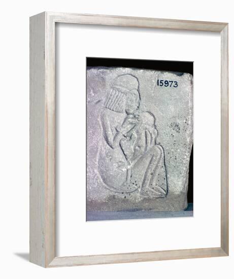 Egyptian relief of a woman suckling a child, 14th century BC. Artist: Unknown-Unknown-Framed Giclee Print