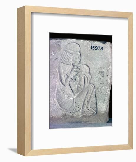 Egyptian relief of a woman suckling a child, 14th century BC. Artist: Unknown-Unknown-Framed Giclee Print