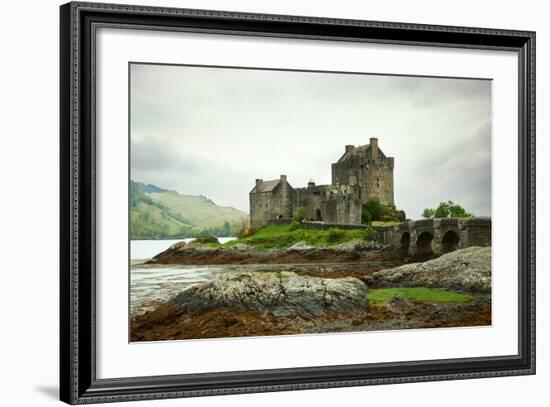 Eilean Donan Castle on a Cloudy Day. Low Tide. Highlands, Scotland. UK-A_nella-Framed Photographic Print