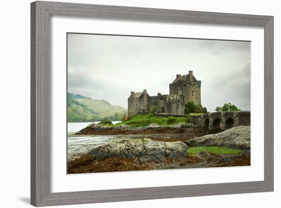 Eilean Donan Castle on a Cloudy Day. Low Tide. Highlands, Scotland. UK-A_nella-Framed Photographic Print