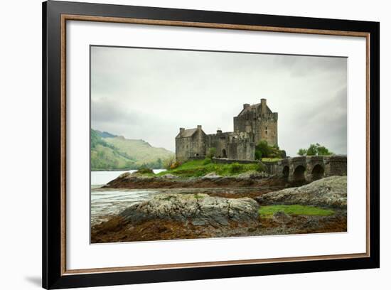 Eilean Donan Castle on a Cloudy Day. Low Tide. Highlands, Scotland. UK-A_nella-Framed Photographic Print