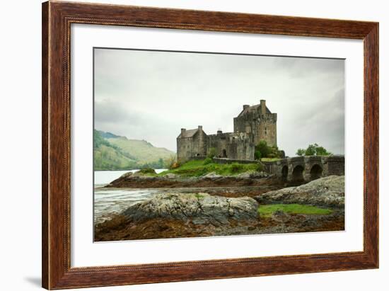 Eilean Donan Castle on a Cloudy Day. Low Tide. Highlands, Scotland. UK-A_nella-Framed Photographic Print