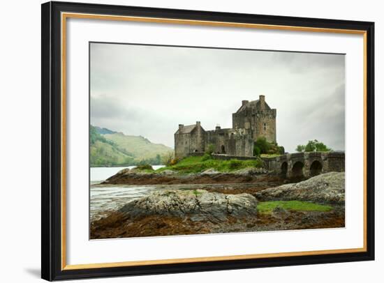 Eilean Donan Castle on a Cloudy Day. Low Tide. Highlands, Scotland. UK-A_nella-Framed Photographic Print