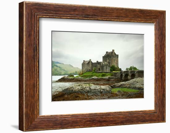 Eilean Donan Castle on a Cloudy Day. Low Tide. Highlands, Scotland. UK-A_nella-Framed Photographic Print