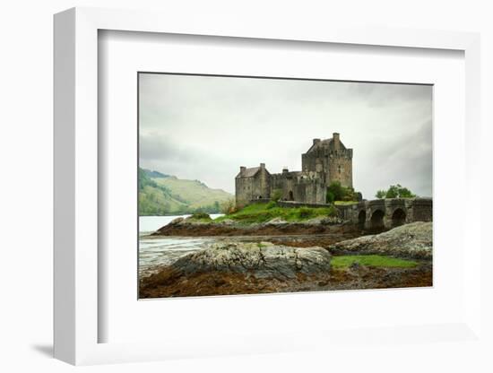 Eilean Donan Castle on a Cloudy Day. Low Tide. Highlands, Scotland. UK-A_nella-Framed Photographic Print