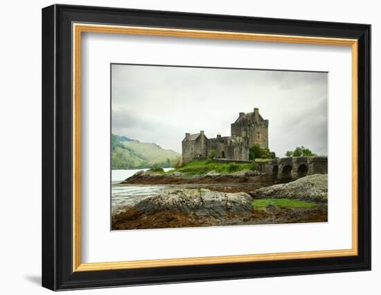 Eilean Donan Castle on a Cloudy Day. Low Tide. Highlands, Scotland. UK-A_nella-Framed Photographic Print