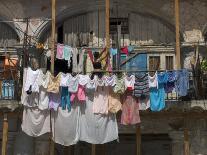 Large Quantity of Laundry Hanging from the Balcony of a Crumbling Building, Habana Vieja, Cuba-Eitan Simanor-Photographic Print