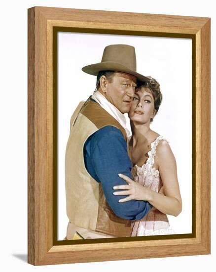 EL DORADO, 1967 directed by HOWARD HAWKS John Wayne and Charlene Holt (photo)-null-Framed Stretched Canvas