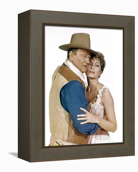 EL DORADO, 1967 directed by HOWARD HAWKS John Wayne and Charlene Holt (photo)-null-Framed Stretched Canvas