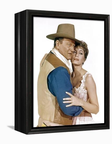 EL DORADO, 1967 directed by HOWARD HAWKS John Wayne and Charlene Holt (photo)-null-Framed Stretched Canvas