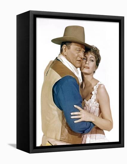 EL DORADO, 1967 directed by HOWARD HAWKS John Wayne and Charlene Holt (photo)-null-Framed Stretched Canvas