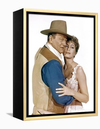 EL DORADO, 1967 directed by HOWARD HAWKS John Wayne and Charlene Holt (photo)-null-Framed Stretched Canvas