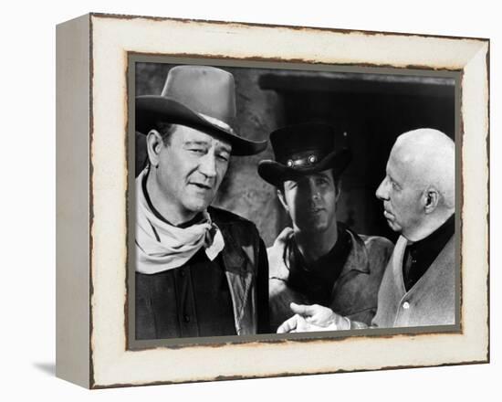 EL DORADO, 1967 directed by HOWARD HAWKS On the set, Howard Hawks with John Wayne and James Caan (b-null-Framed Stretched Canvas