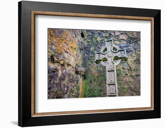 Elaborate Celtic cross marks a grave at a historic Irish church, County Mayo, Ireland.-Betty Sederquist-Framed Photographic Print