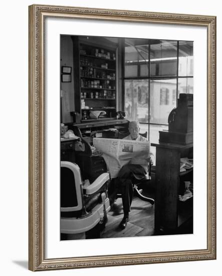 Elderly Barber Sitting Reading the Morning Paper in Small Village Shop in Small New England Town-Yale Joel-Framed Photographic Print