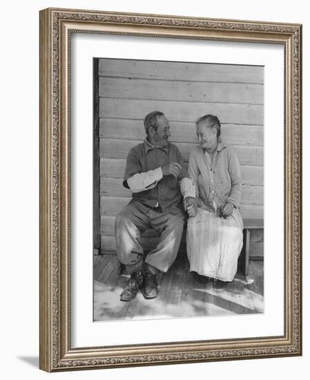 Elderly Couple Holding Hands-Peter Stackpole-Framed Photographic Print