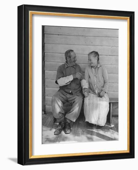 Elderly Couple Holding Hands-Peter Stackpole-Framed Photographic Print