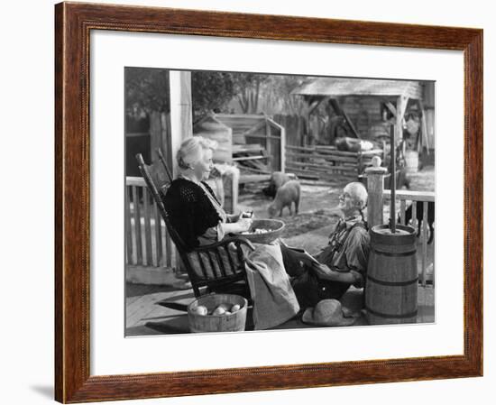 Elderly Couple on Porch of Farmhouse-null-Framed Photo