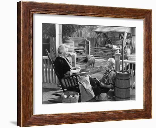 Elderly Couple on Porch of Farmhouse-null-Framed Photo