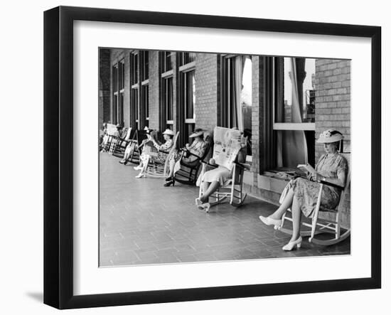 Elderly Ladies Reading Books and Newspapers While Rocking in Chairs on the Terrace of Dennis Hotel-Alfred Eisenstaedt-Framed Photographic Print