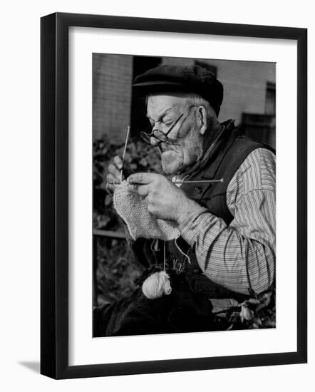 Elderly Man Knitting Garments During Drive to Provide Goods to Servicemen During the War-null-Framed Photographic Print