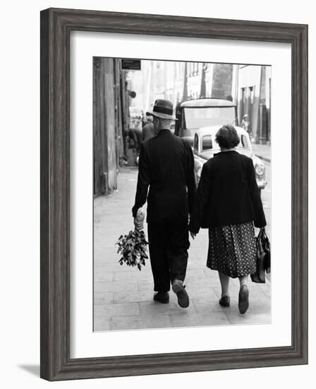 Elderly Polish Couple Walking Hand in Hand-Paul Schutzer-Framed Photographic Print