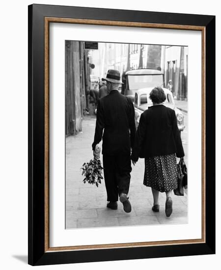 Elderly Polish Couple Walking Hand in Hand-Paul Schutzer-Framed Photographic Print