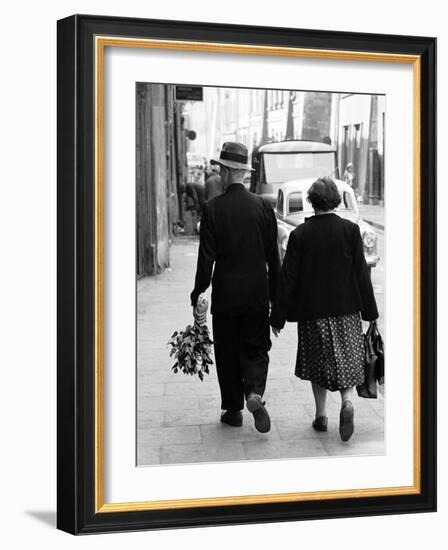 Elderly Polish Couple Walking Hand in Hand-Paul Schutzer-Framed Photographic Print