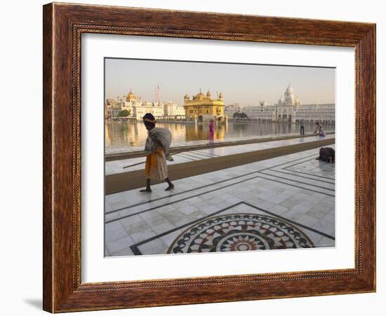 Elderly Sikh Pilgrim with Bundle and Stick Walking Around Holy Pool, Amritsar, India-Eitan Simanor-Framed Photographic Print