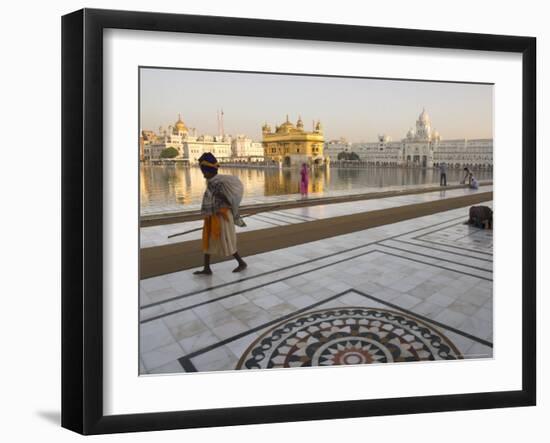 Elderly Sikh Pilgrim with Bundle and Stick Walking Around Holy Pool, Amritsar, India-Eitan Simanor-Framed Photographic Print