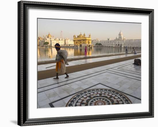 Elderly Sikh Pilgrim with Bundle and Stick Walking Around Holy Pool, Amritsar, India-Eitan Simanor-Framed Photographic Print